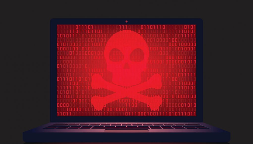 Laptop with a red, glowing crossbones on it. Ransomware.