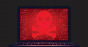 Laptop with a red, glowing crossbones on it. Ransomware.
