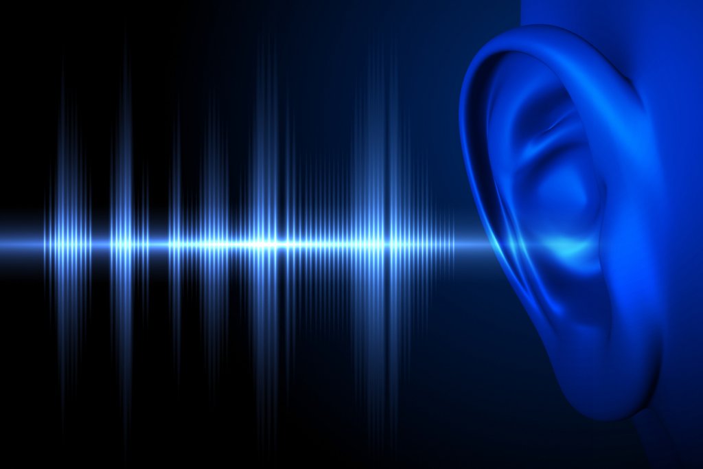 Digital blue soundwave entering a digitized, blue. human's ear