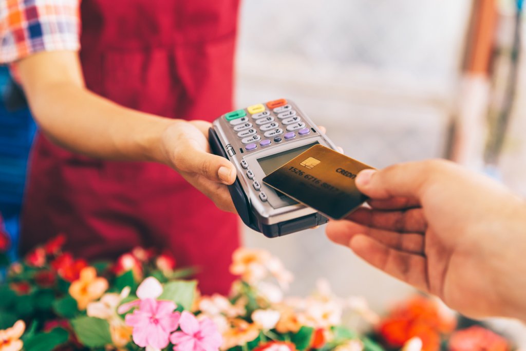Contactless card used in payment for flowers