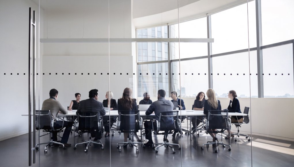 Colleagues at business meeting in conference room