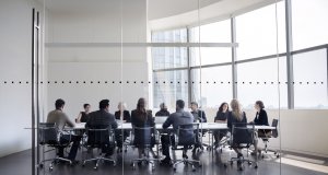 Colleagues at business meeting in conference room