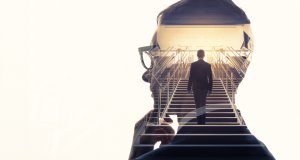 Double exposure of a businessman and stairs. Success of business concept.