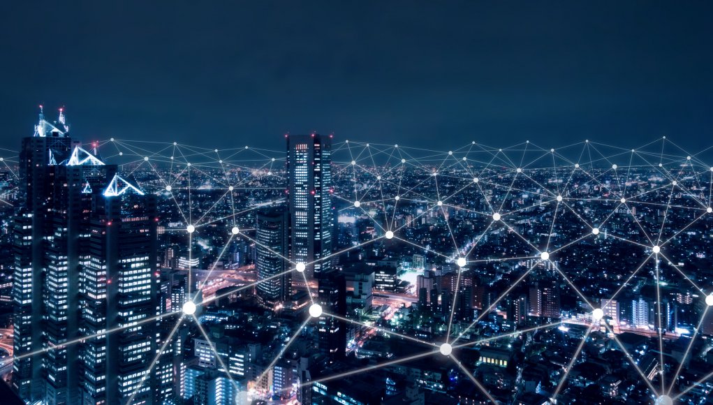 Telecommunication network above city, wireless mobile internet technology for smart grid or 5G LTE data connection, concept about IoT, global business, fintech, blockchain