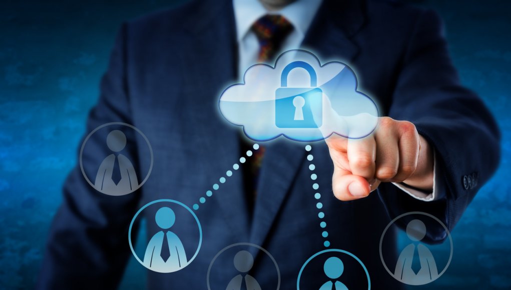 Cloud security intelligence related image. Executive is touching a cloud.