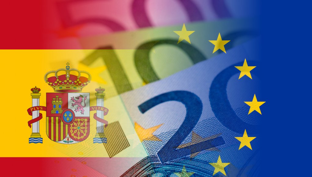 spain and eu flags with euro banknotes