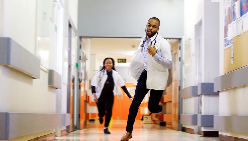 Doctor on Call Running to Emergency