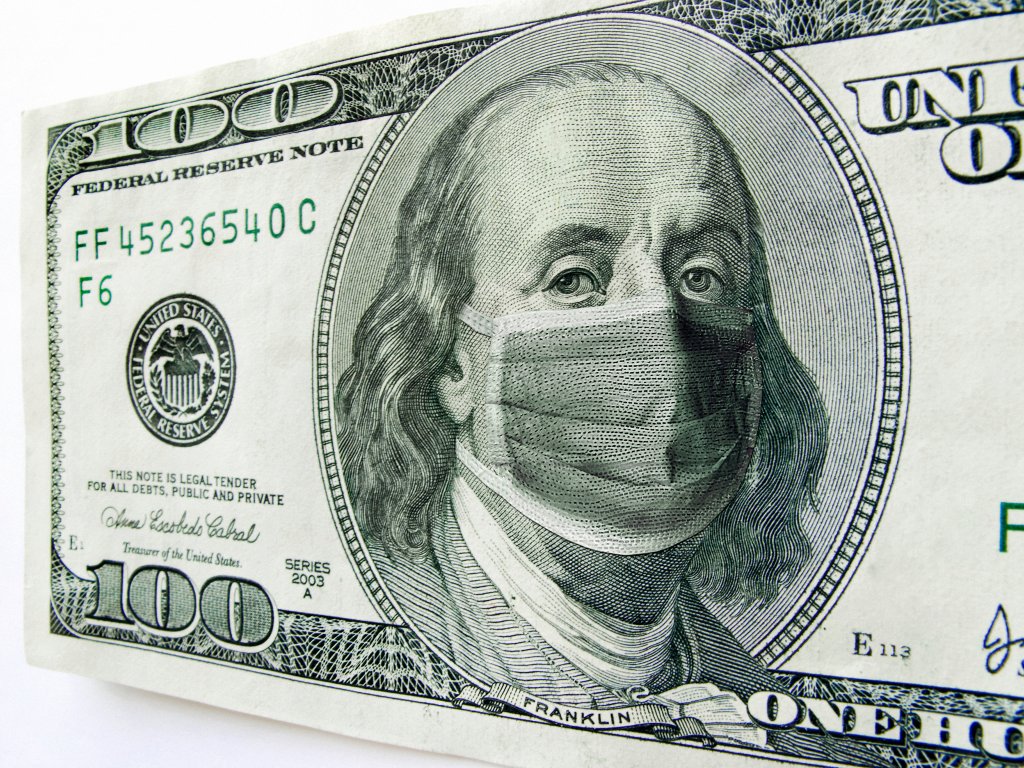 $100 USD bill wearing coronavirus mask