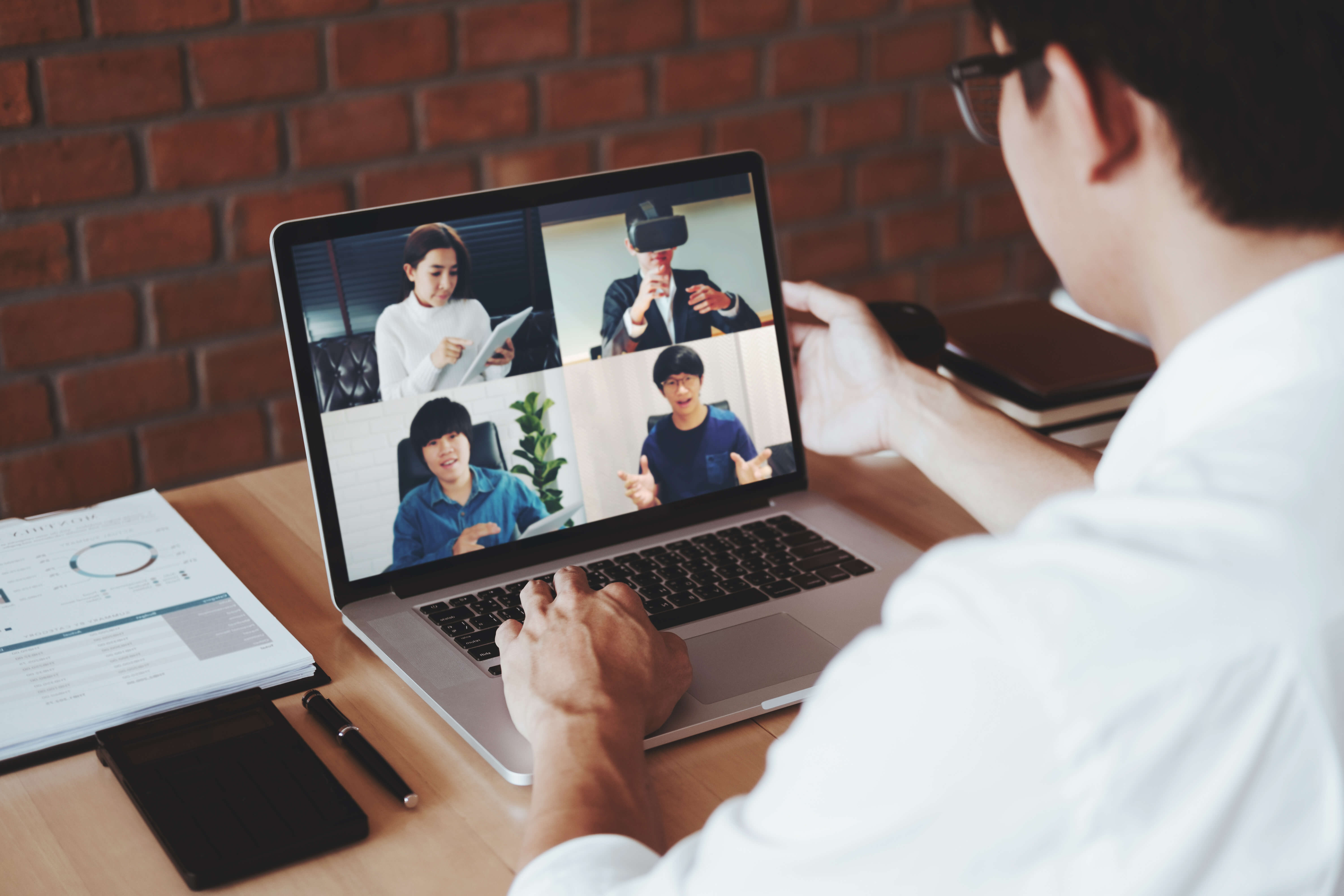 Person at desk on Zoom