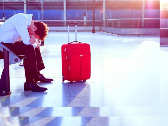 Person stuck in airport, 5G rollout gone-wrong