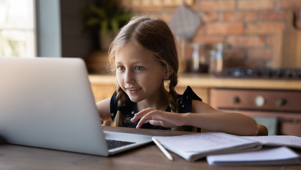 Girl learning on laptop