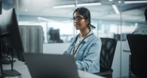 Cyber security professional at desk