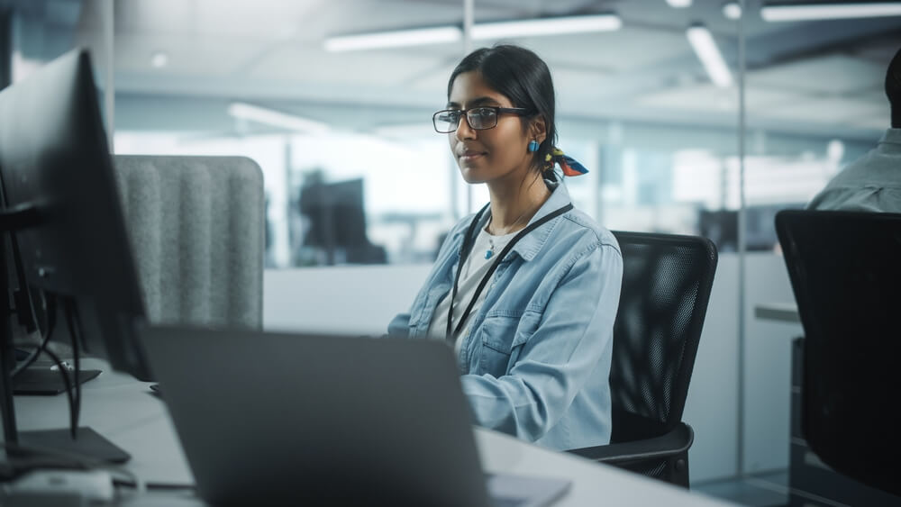 Cyber security professional at desk