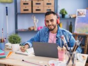 Young artist leveraging computer for art purposes