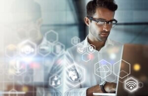 Global CISO looking at laptop and determining how to limit operational costs