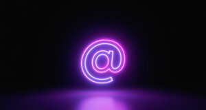 What is email sandboxing? There is an email @ symbol in the center of this image.