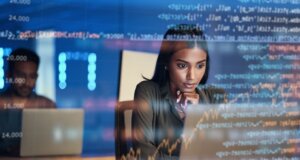 Cyber threat intelligence benefits woman working in office environment