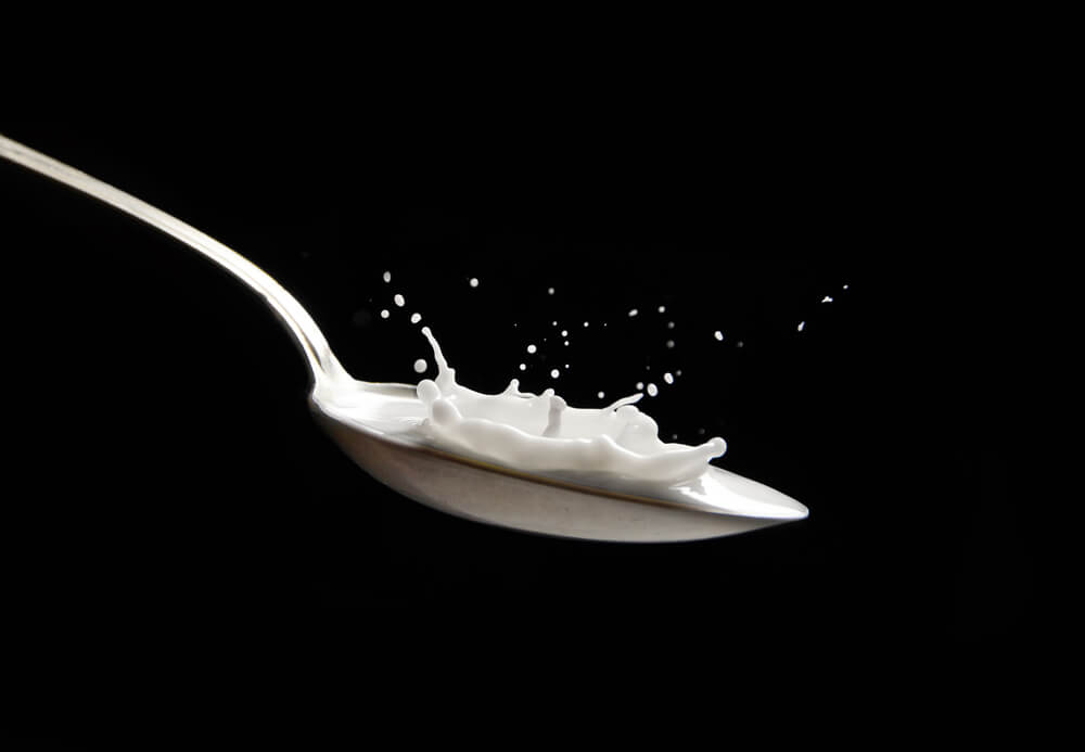 Liquid data storage concept art - droplets of milk in-motion