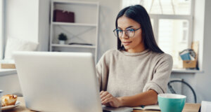 Gig worker at laptop